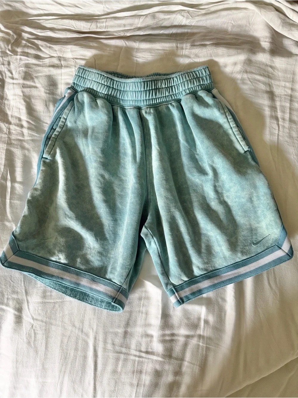 Nike turquoise stone-washed shorts, youth medium